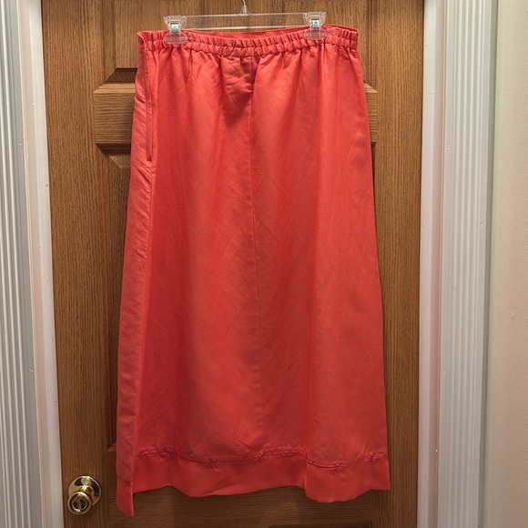 Long modest Caran New York coral skirt with design at bottom. - Picture 2 of 9